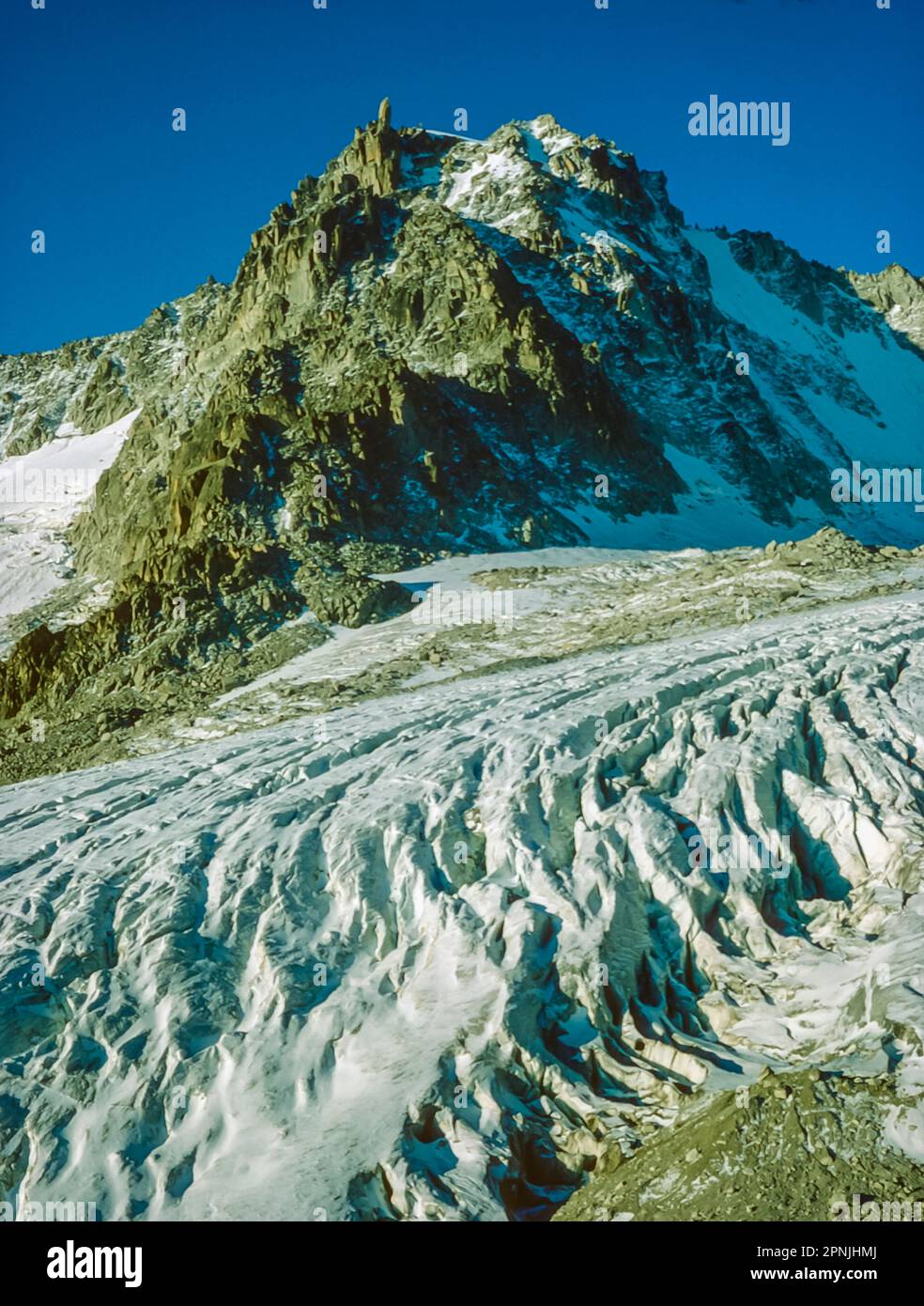 Looking across the Trient glacier towards the peak of Aiguille Dorees as seen from the Chamonix to Zermatt Haute Route Stock Photo