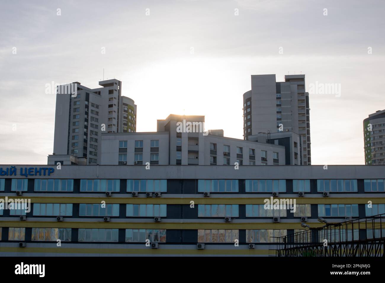 Belarus, Minsk - 24 march, 2023: Tall modern house at sunset close up Stock Photo