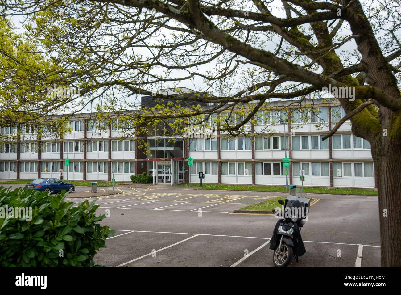 Maidenhead, Berkshire, UK. 19th April, 2023. The once popular Holiday Inn hotel in Maidenhead, Berkshire which is now closed to the public as it is used to house asylum seekers. Home Secretary, Suella Braverman is to announce a national crisis relating to the small boats crossing the Channel into the UK. 56,000 asylum seekers are expected to cross the Channel into the UK this year alone. Credit: Maureen McLean/Alamy Live News Stock Photo