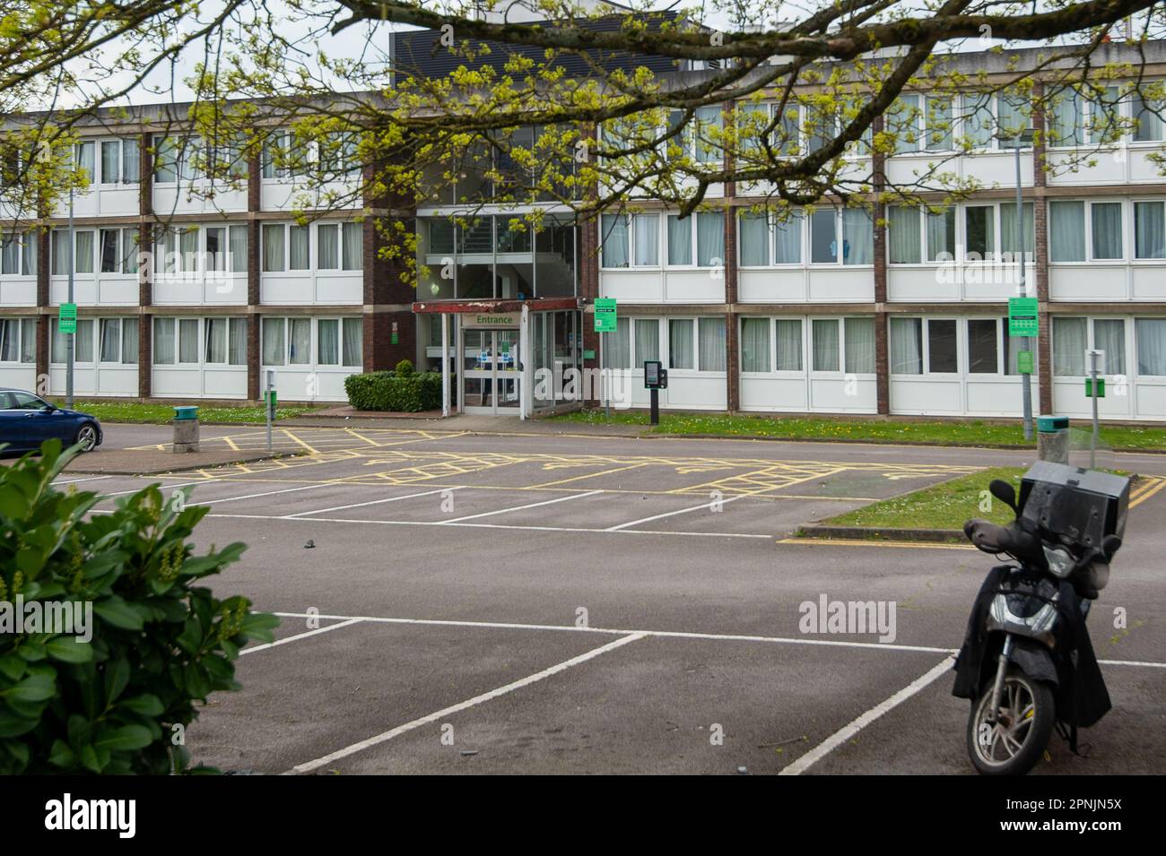 Maidenhead, Berkshire, UK. 19th April, 2023. The once popular Holiday Inn hotel in Maidenhead, Berkshire which is now closed to the public as it is used to house asylum seekers. Home Secretary, Suella Braverman is to announce a national crisis relating to the small boats crossing the Channel into the UK. 56,000 asylum seekers are expected to cross the Channel into the UK this year alone. Credit: Maureen McLean/Alamy Live News Stock Photo