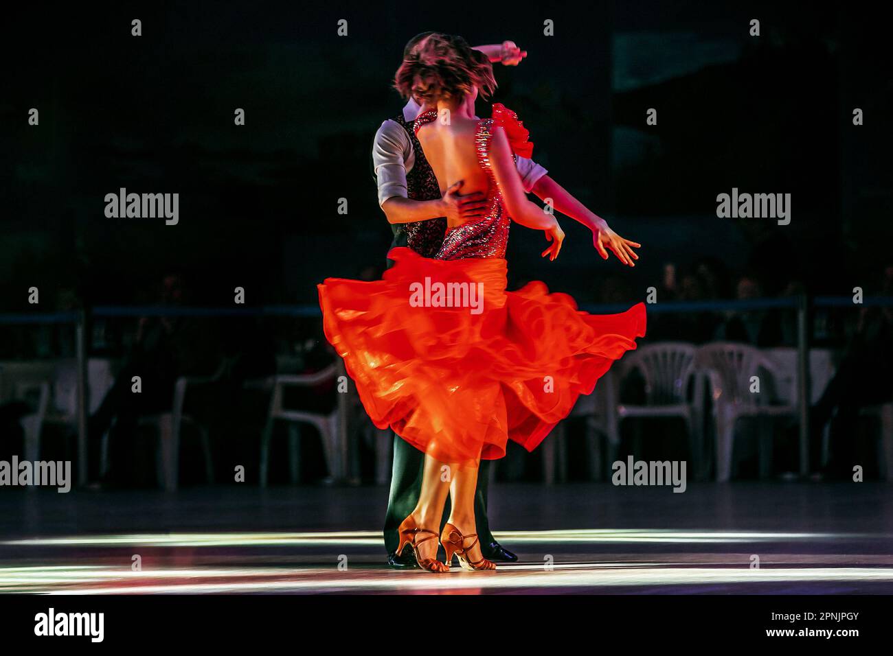 couple dancing in competitive ballroom dancesport, demonstration performance of best dancers Stock Photo