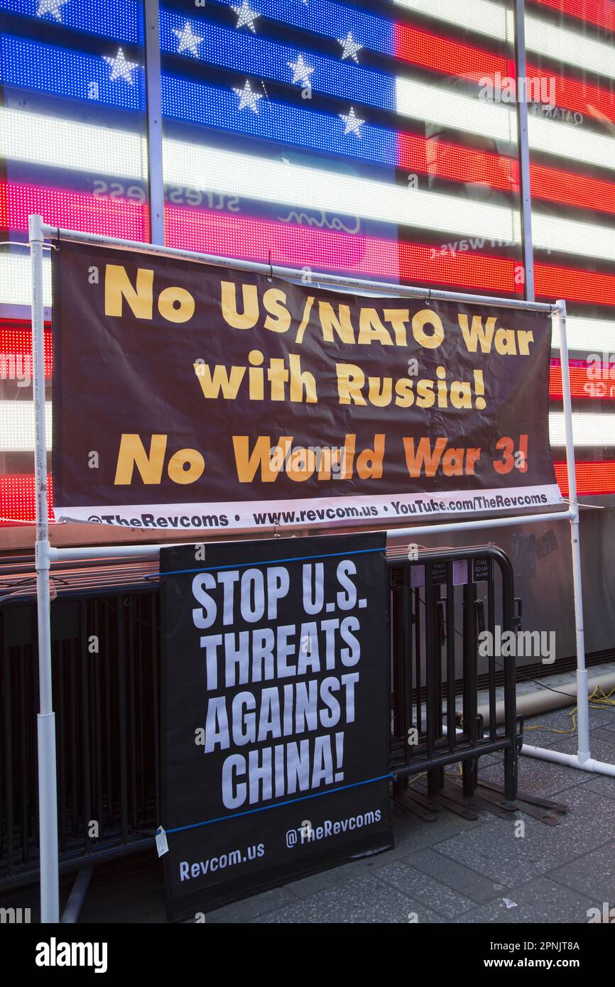 Rally at the U.S. Armed Forces Recruiting Station in Times Square, NYC,  to stop US military expansion around the world, fanning the fires and threats of opposition toward China and using the war in Ukraine to perpetuate a proxy war with Russia to expand US dominance internationally. Stock Photo