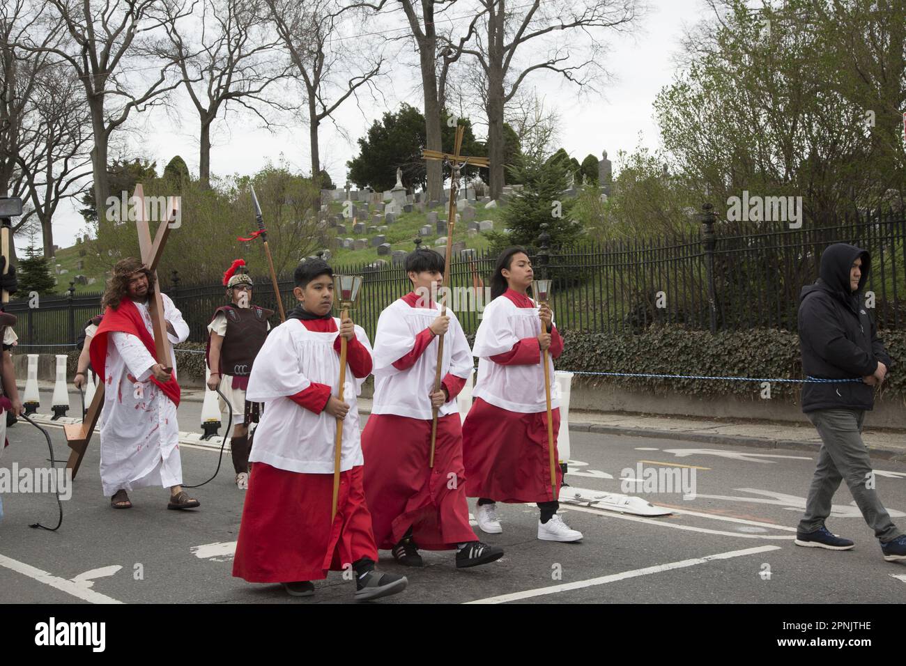 Parishoners of various churches walk the stations of the Cross together ...