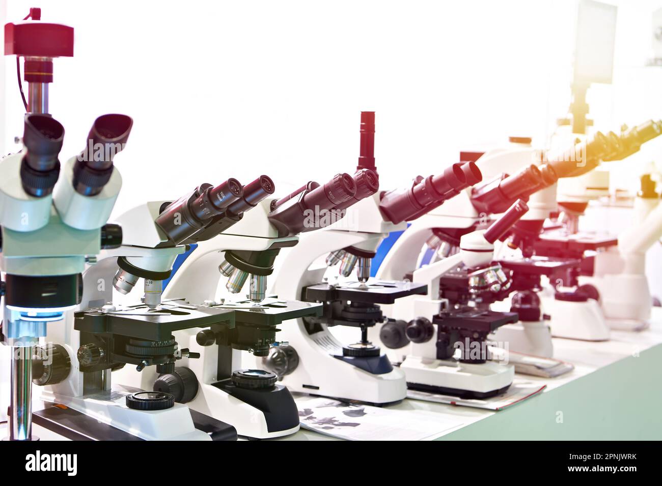 Optical microscopes in the store at the exhibition Stock Photo - Alamy