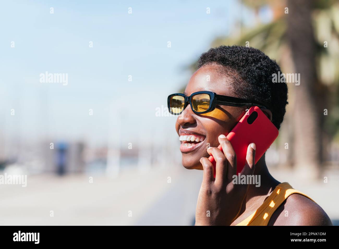Cheerful african woman hi-res stock photography and images - Alamy