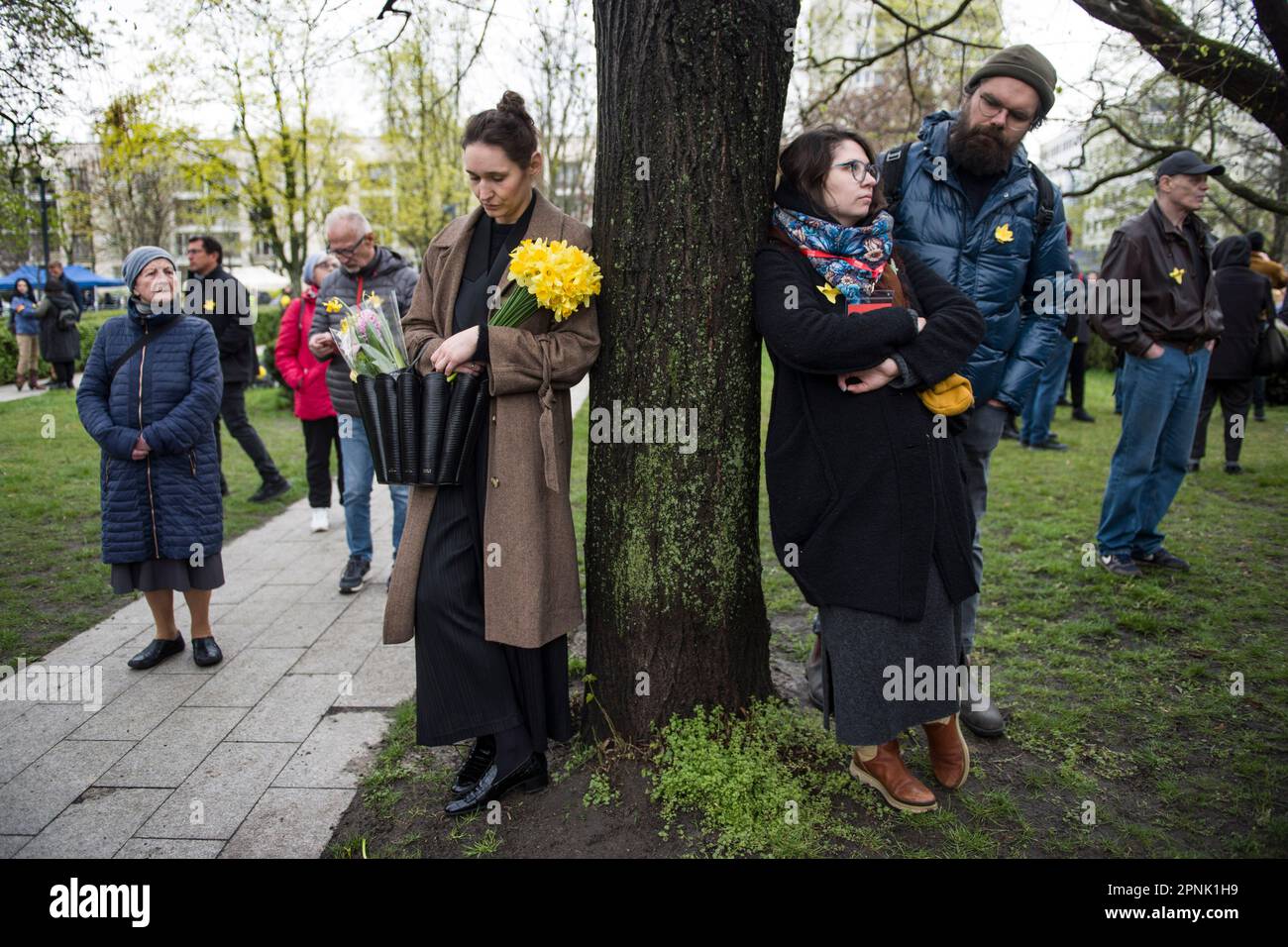 Citizens and participants of the ceremony are seen holding daffodils as a symbol of the Ghetto Uprising during the ceremony. Poland marked the 80th anniversary of the Warsaw Ghetto Uprising - a violent revolt that occurred from April 19 to May 16, 1943, during World War II. Residents of the Jewish ghetto in Nazi-occupied Warsaw, staged the armed revolt to prevent deportations to Nazi-run extermination camps. The Uprising became an everlasting symbol of the resistance of Polish Jews against the Holocaust. Between 1942 to 1943 Germans transported over 300,000 Jews from the Warsaw Ghetto to the d Stock Photo