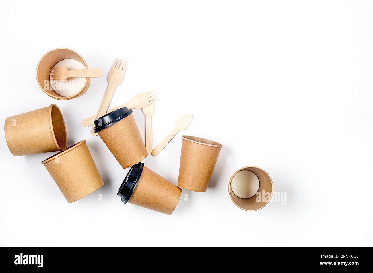 Top view on disposable paper cups, launch box, wooden cutlery. Kraft ...