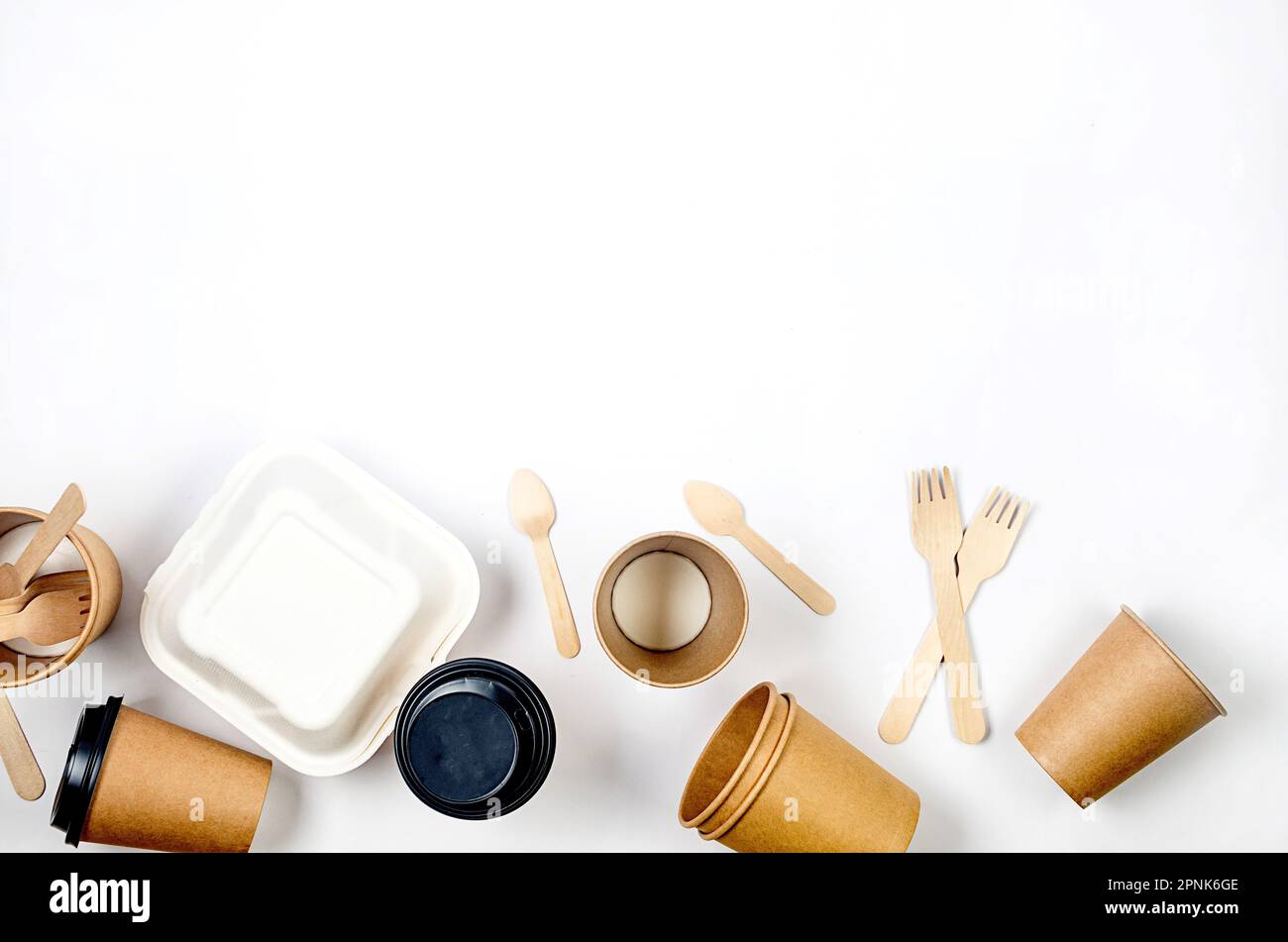 Top view on disposable paper cups, launch box, wooden cutlery. Kraft ...