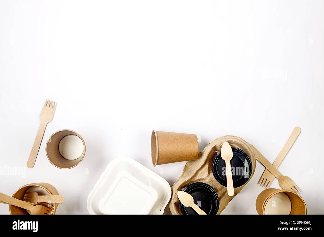 Top view on disposable paper cups, launch box, wooden cutlery. Kraft ...