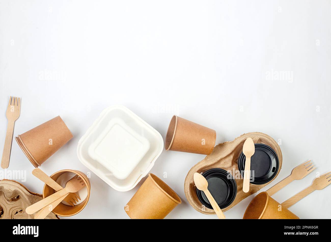 Top view on disposable paper cups, launch box, wooden cutlery. Kraft ...