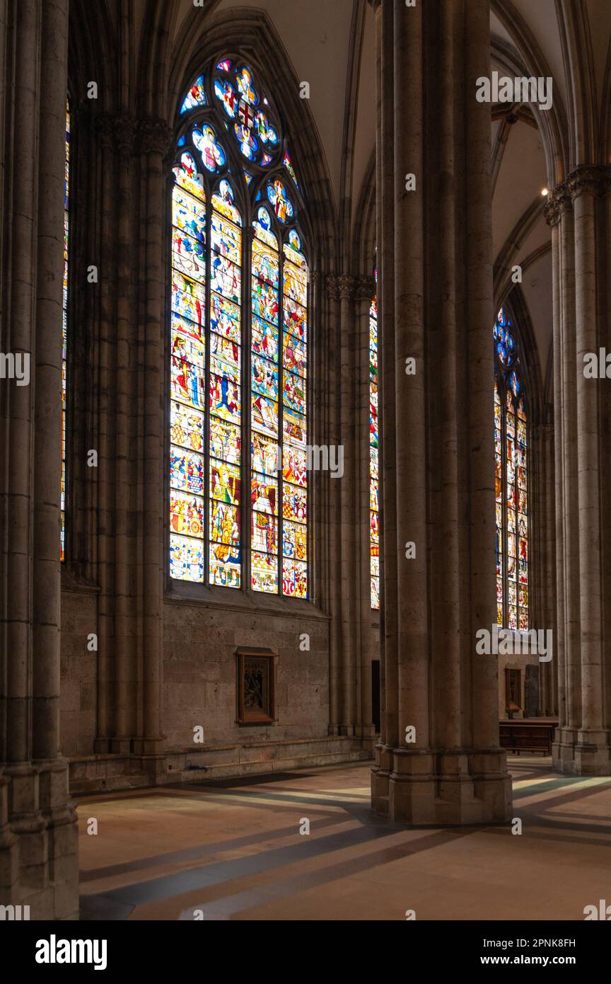 Colonnade and stained glass of the Cologne cathedral, Germany Stock Photo