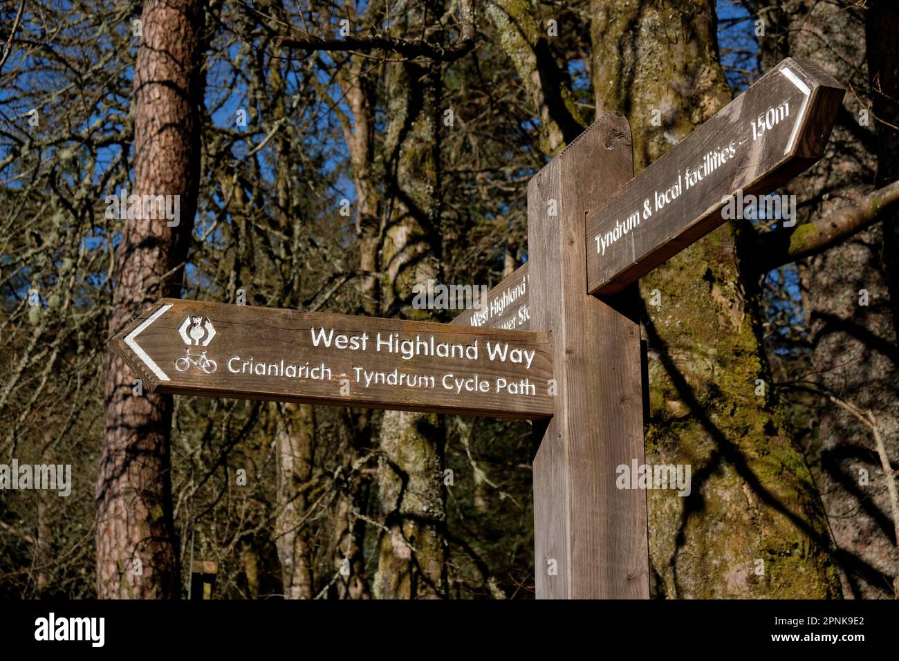 Fingerpost sign for the West Highland Way and the Tyndrum Cycle Path to Crianlarich, Tyndrum, Scotland Stock Photo