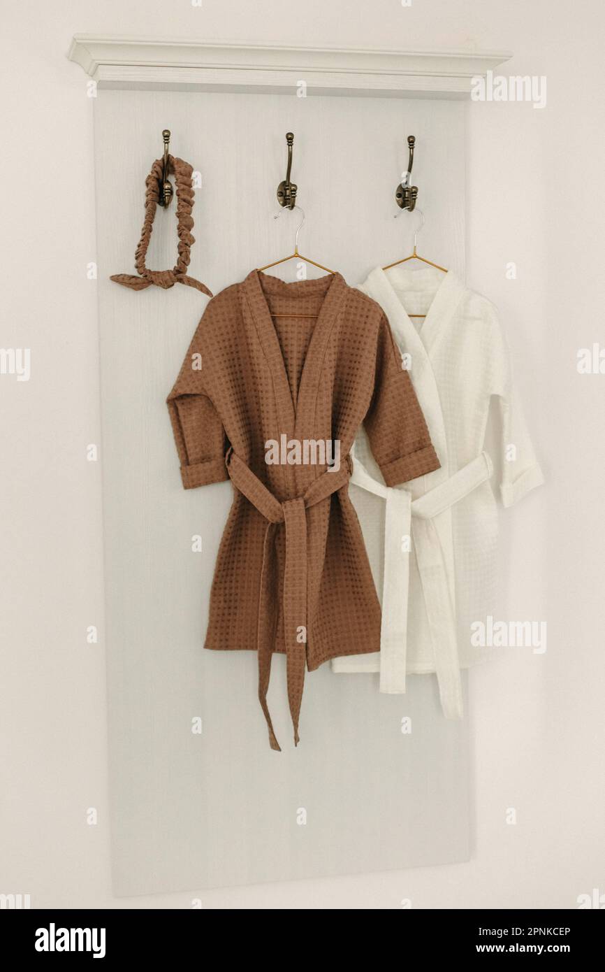 Bath Robe Hanger Rack Linen bathrobes hang on a hanger in the bathroom Stock Photo - Alamy