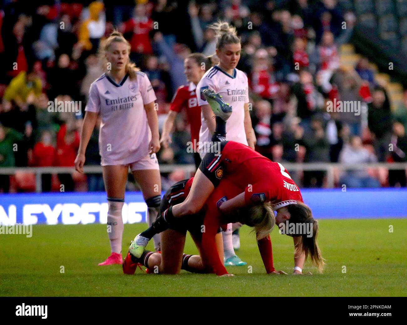 Manchester United's Ella Toone congratulates team-mate Alessia Russo (bottom) after scoring their side's first goal of the game during the Barclays Women's Super League match at Leigh Sports Village, Manchester. Picture date: Wednesday April 19, 2023. Stock Photo