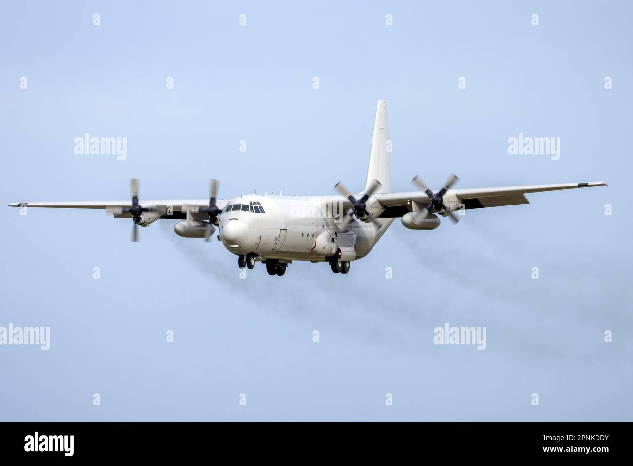 an-all-white-lockheed-l-100-30-hercules-l-382g-reg-n2679c-trailing