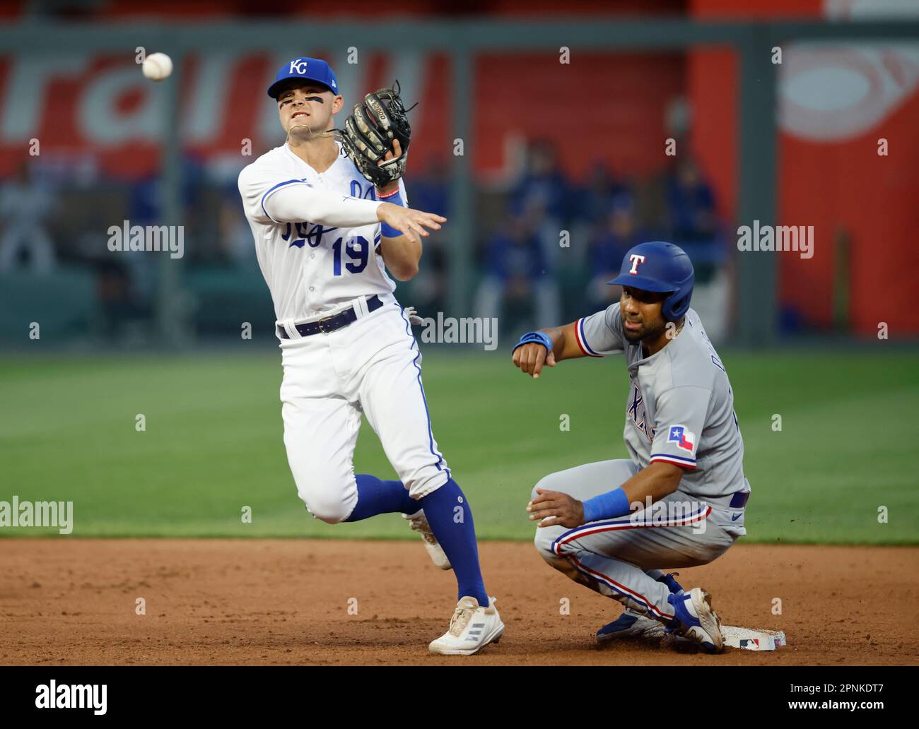Texas Rangers' Ezequiel Duran, right, is out at second base as Kansas