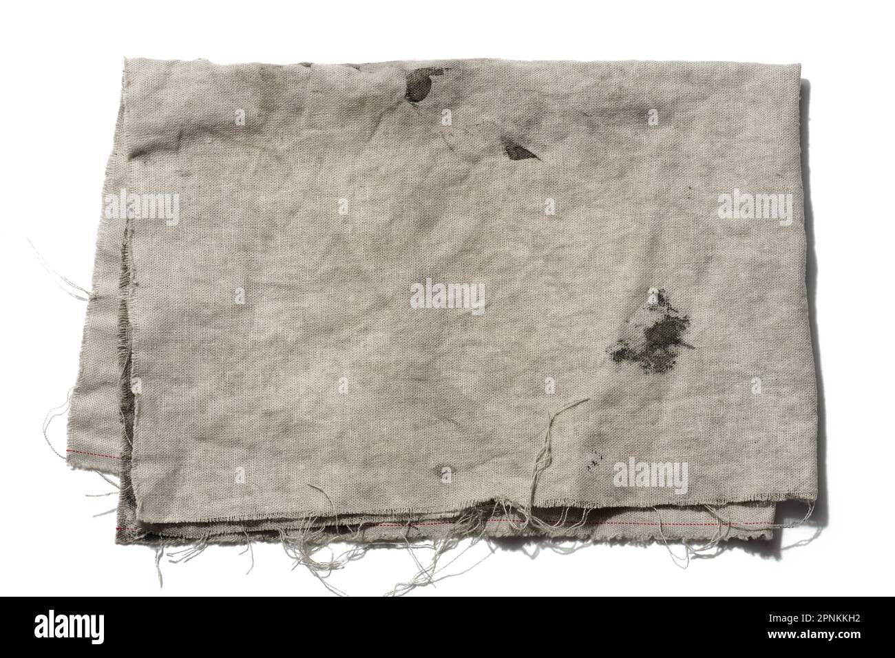 Folded gray linen tea towel on white background, close up Stock Photo