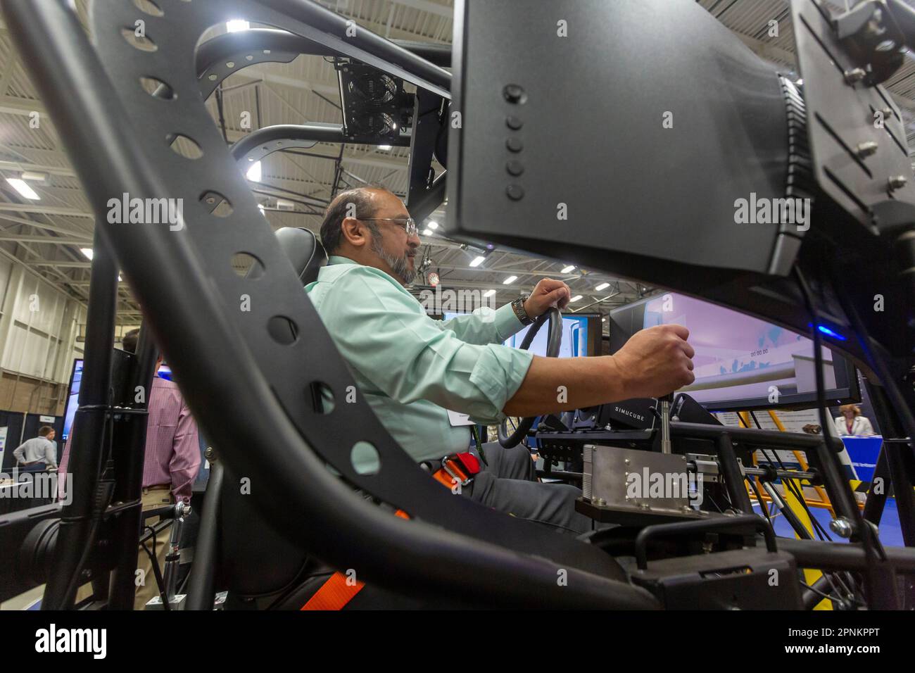 Warren, Michigan, USA. 19th Apr, 2023. The Michigan Defense Exposition allowed military contractors to disiplay their products. A Humvee simulator was displayed by Applied Research Associates (ARA). Credit: Jim West/Alamy Live News Stock Photo