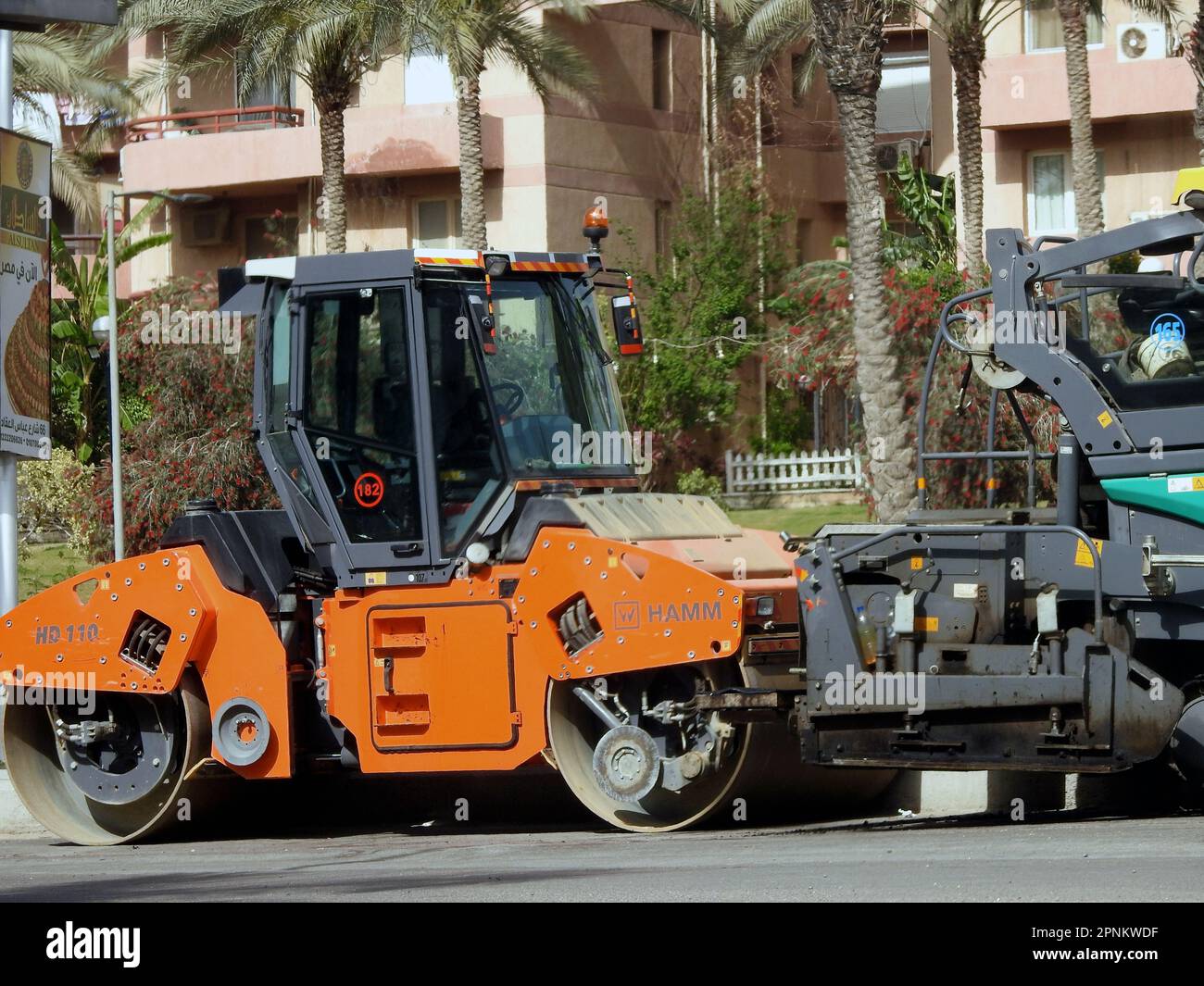 Cairo, Egypt, April 18 2023 Asphalt compactor paver truck, A paver