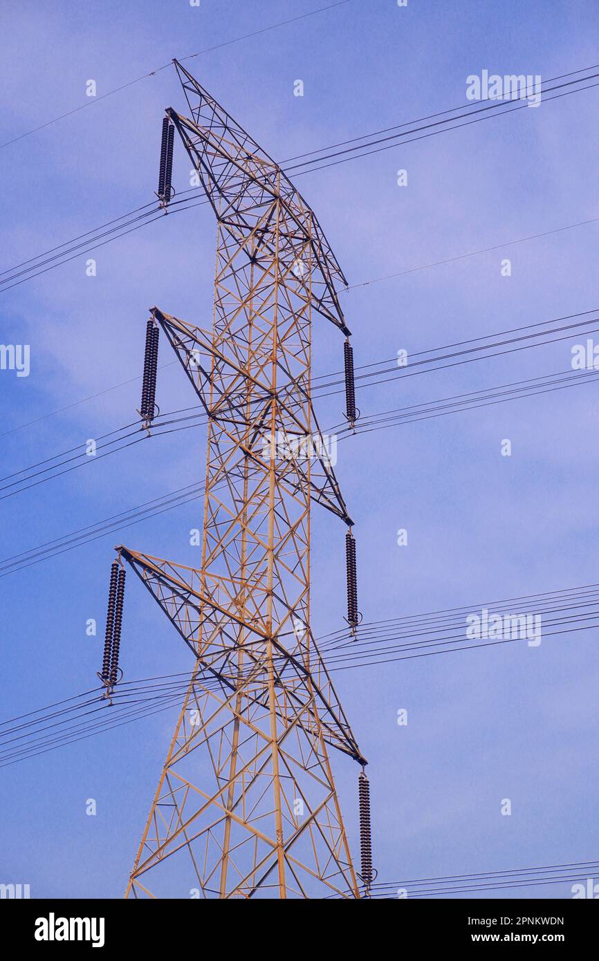 high-voltage electric tower with blue sky background Stock Photo