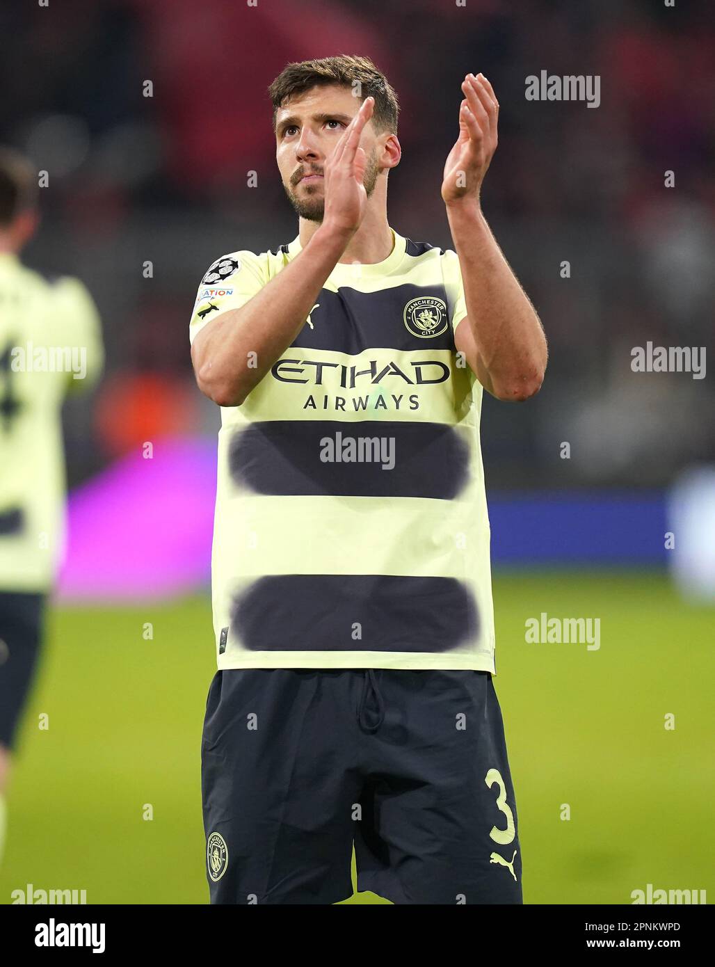 Manchester City's Ruben Dias applauds the fans following victory in the UEFA Champions League