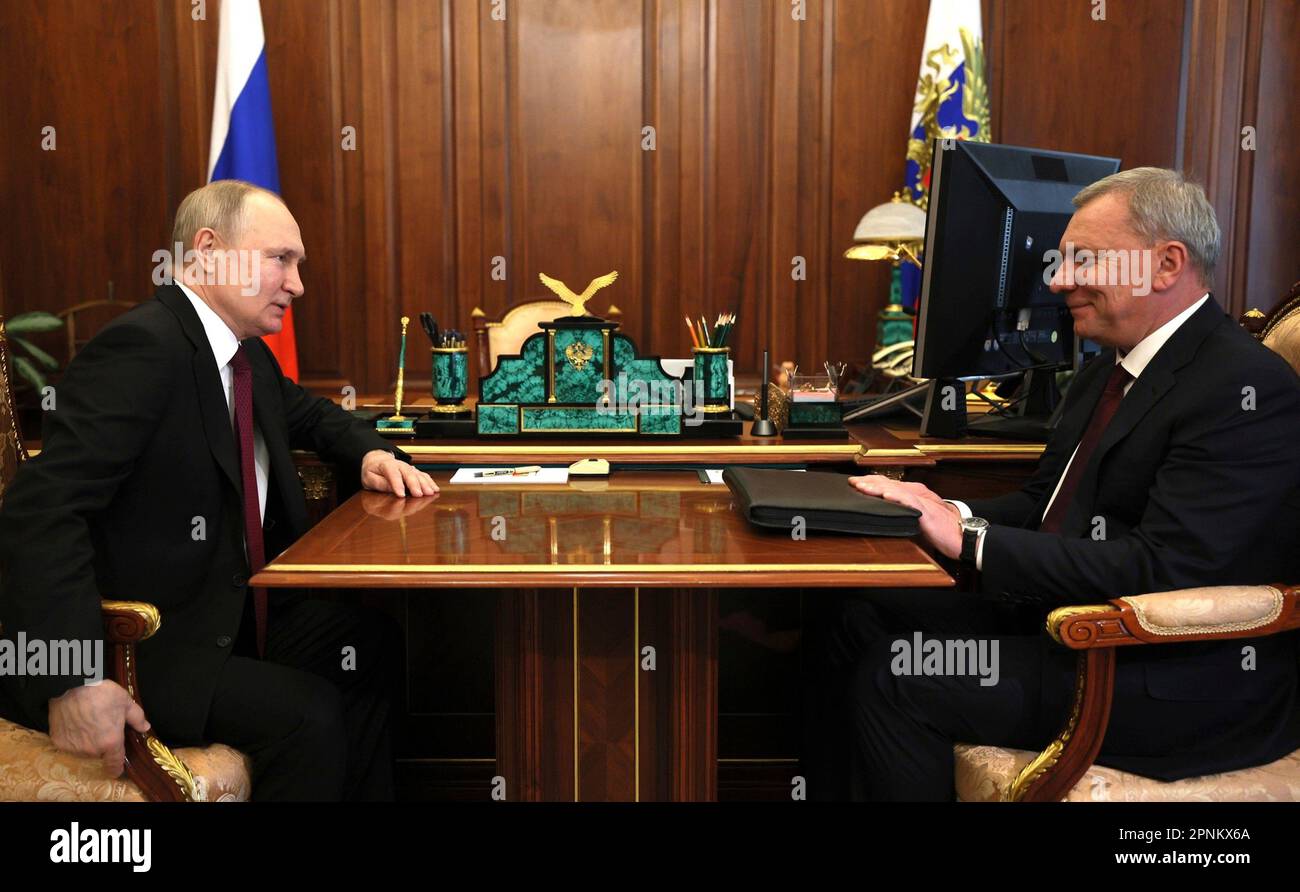 Moscow, Russia. 12 April, 2023. Russian President Vladimir Putin holds a face-to-face meeting with the CEO of the Russian Federal Space Agency Yuri Borisov, right, at the Kremlin, April 12, 2023 in Moscow, Russia.  Credit: Gavriil Grigorov/Kremlin Pool/Alamy Live News Stock Photo