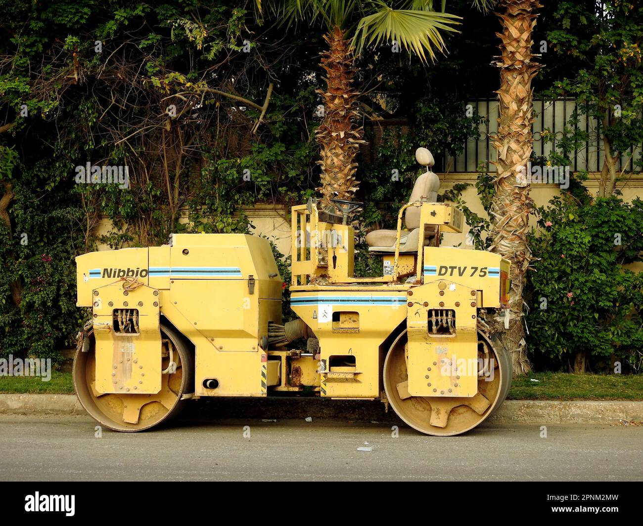 Cairo, Egypt, April 7 2023 Asphalt compactor paver truck, A paver