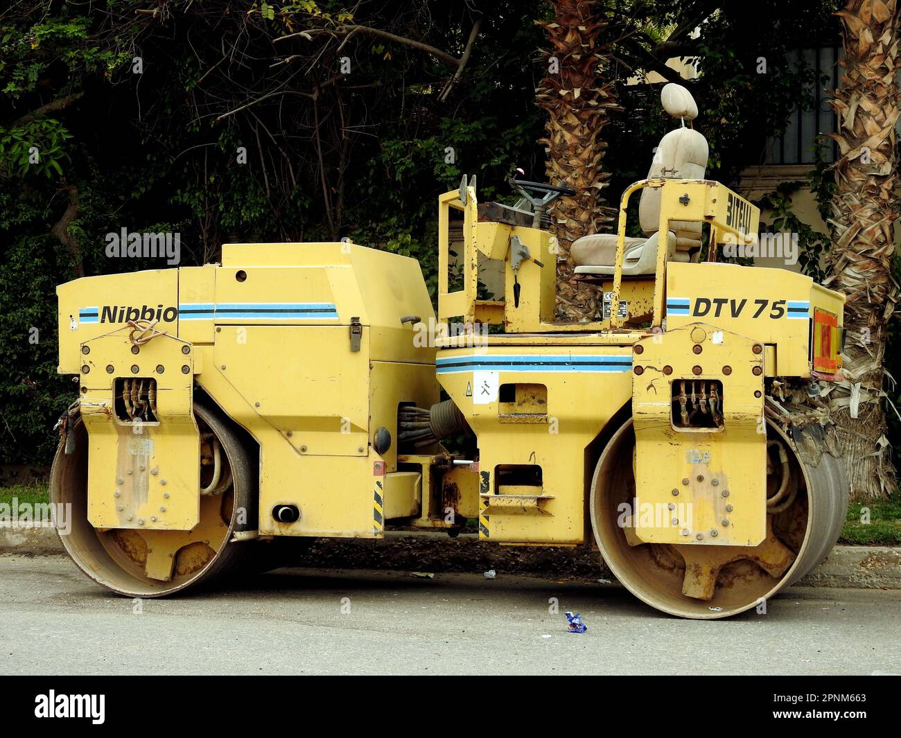 Cairo, Egypt, April 8 2023 Asphalt compactor paver truck, A paver
