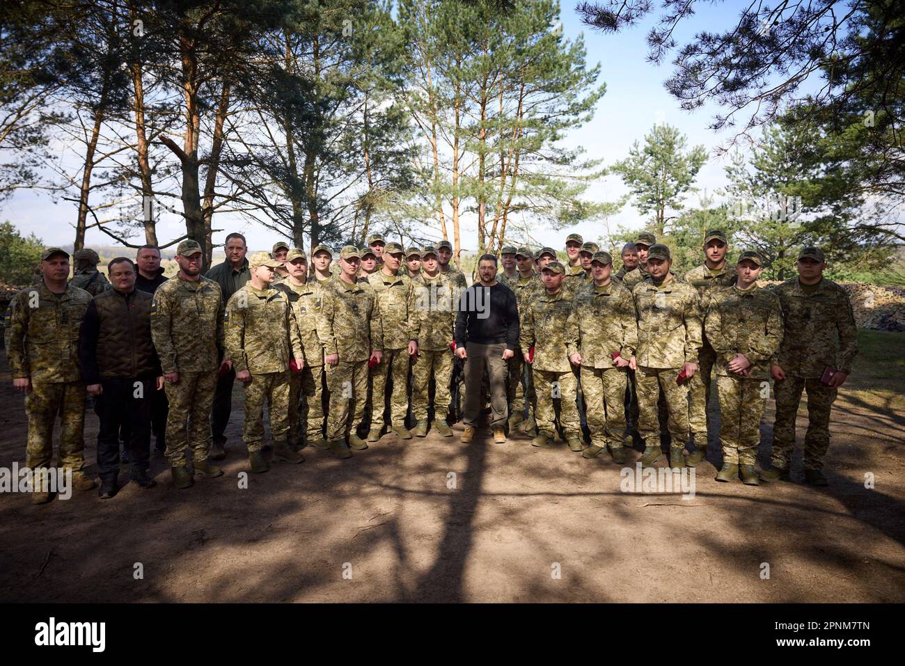 Koshary, Ukraine. 19th Apr, 2023. Ukrainian President Volodymyr Zelenskyy, center, poses for photos with Border Guards during a visit to the border region where Ukraine, Poland, and Belarus meet, April 19, 2023 in Koshary, Volyn Oblast, Ukraine. Credit: Pool Photo/Ukrainian Presidential Press Office/Alamy Live News Stock Photo