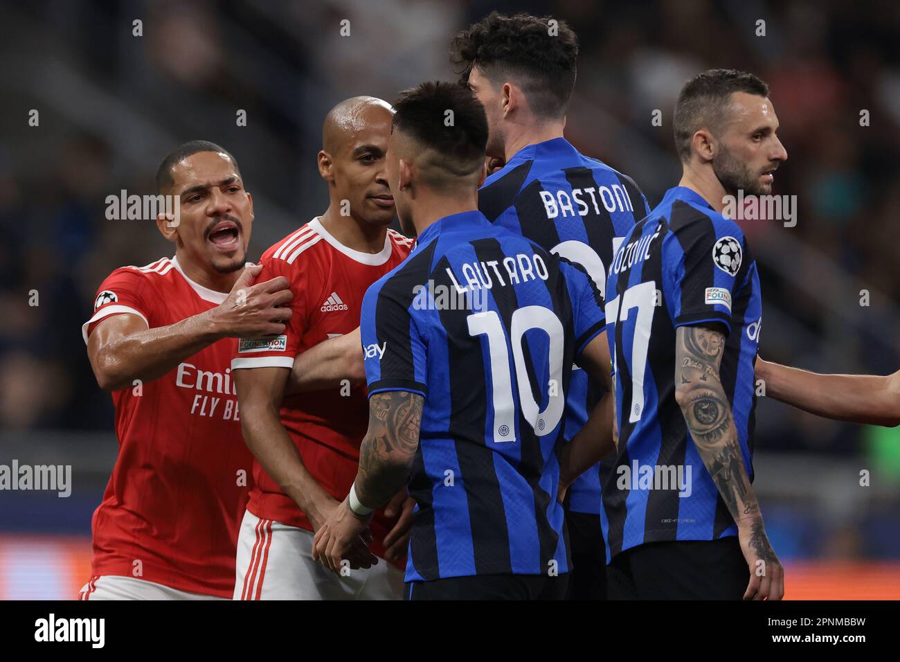 Milan, Italy. 19th Apr, 2023. Gilberto of SL Benfica steps in as Lautaro Martinez of FC Internazionale squares up to Joao Mario of SL Benfica during the UEFA Champions League match at Giuseppe Meazza, Milan. Picture credit should read: Jonathan Moscrop/Sportimage Credit: Sportimage/Alamy Live News Stock Photo