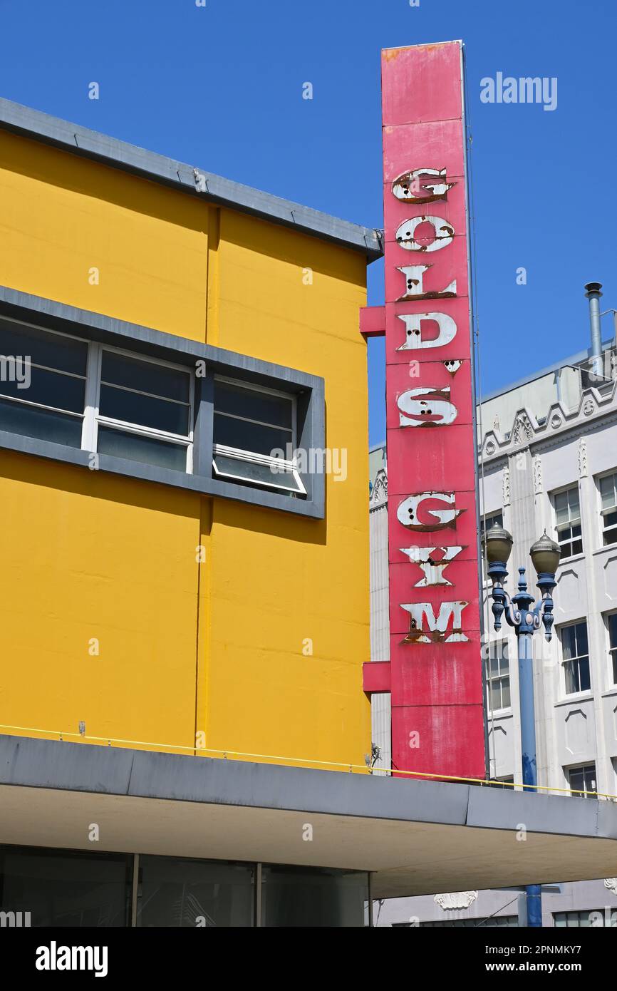 LONG BEACH, CALIFORNIA - 19 APR 2023: Golds Gym sign in Downtown Long Beach. The weathered sign is at the Gyms former location, at Pine Ave and 4th St Stock Photo