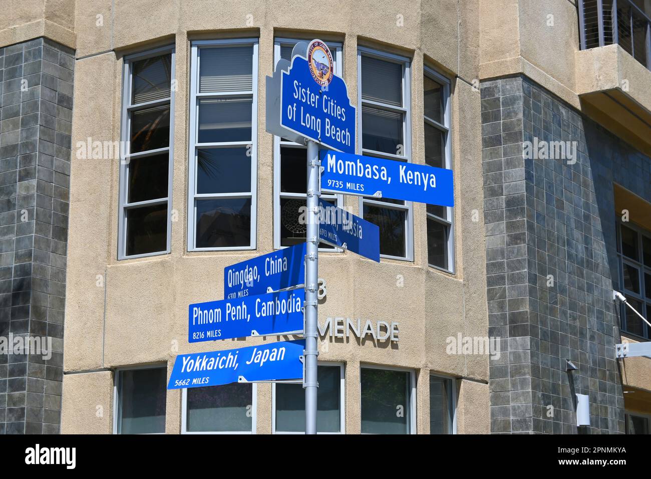 LONG BEACH, CALIFORNIA - 19 APR 2023: Street sign with the Sister Cities of Long Beach on the Promenade.. Stock Photo