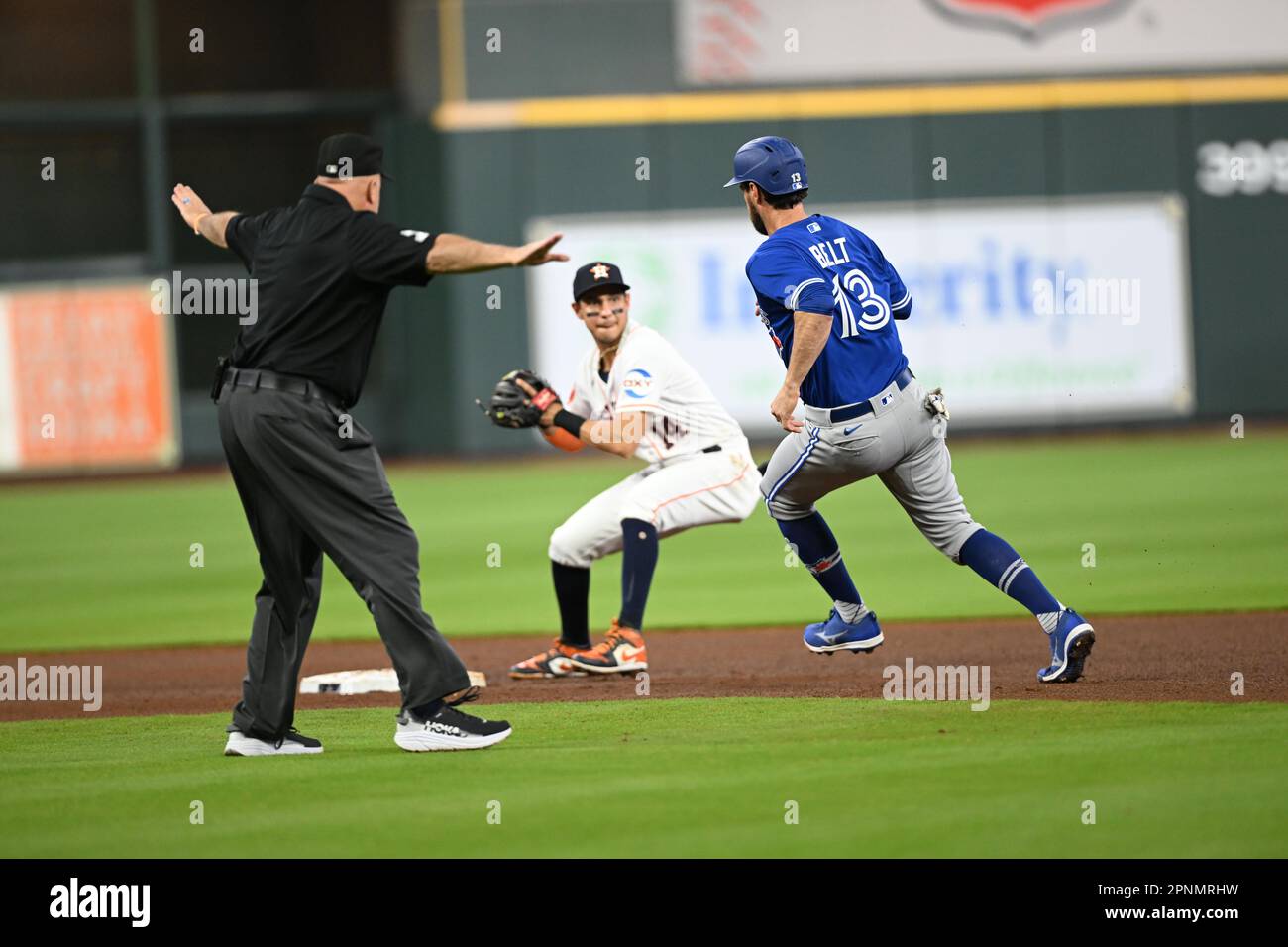 Toronto Blue Jays first baseman Brandon Belt (13) is safe at second as