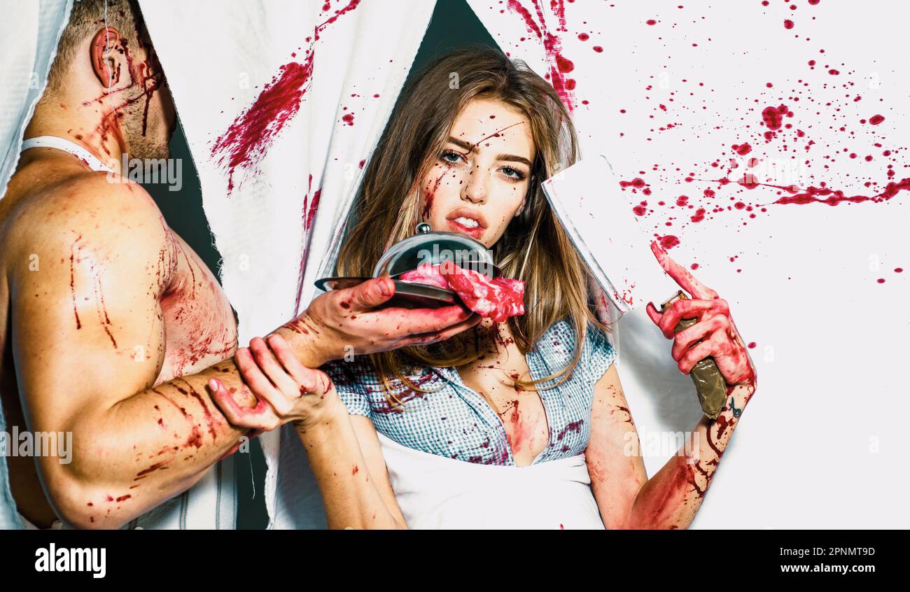 cannibalism. donation and donar. zombie. medical transplantation. meatman in butcher shop, butchery. bloody halloween. anatomy. couple in blood. human Stock Photo