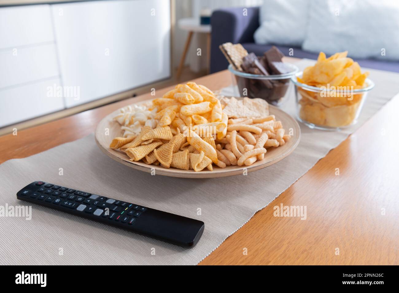 Remote control snack hi-res stock photography and images - Alamy