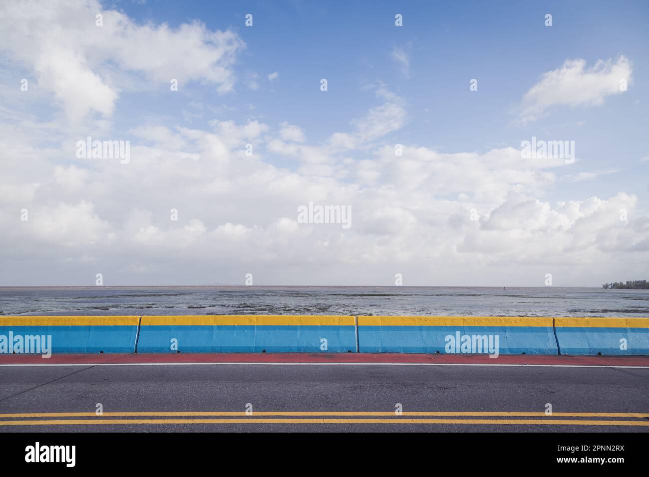 Street lane with blue sky and cloud background Stock Photo