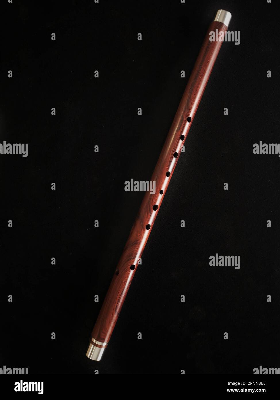 Thai flute. Flute made from siam rosewood with aluminum wrap design Stock Photo Alamy