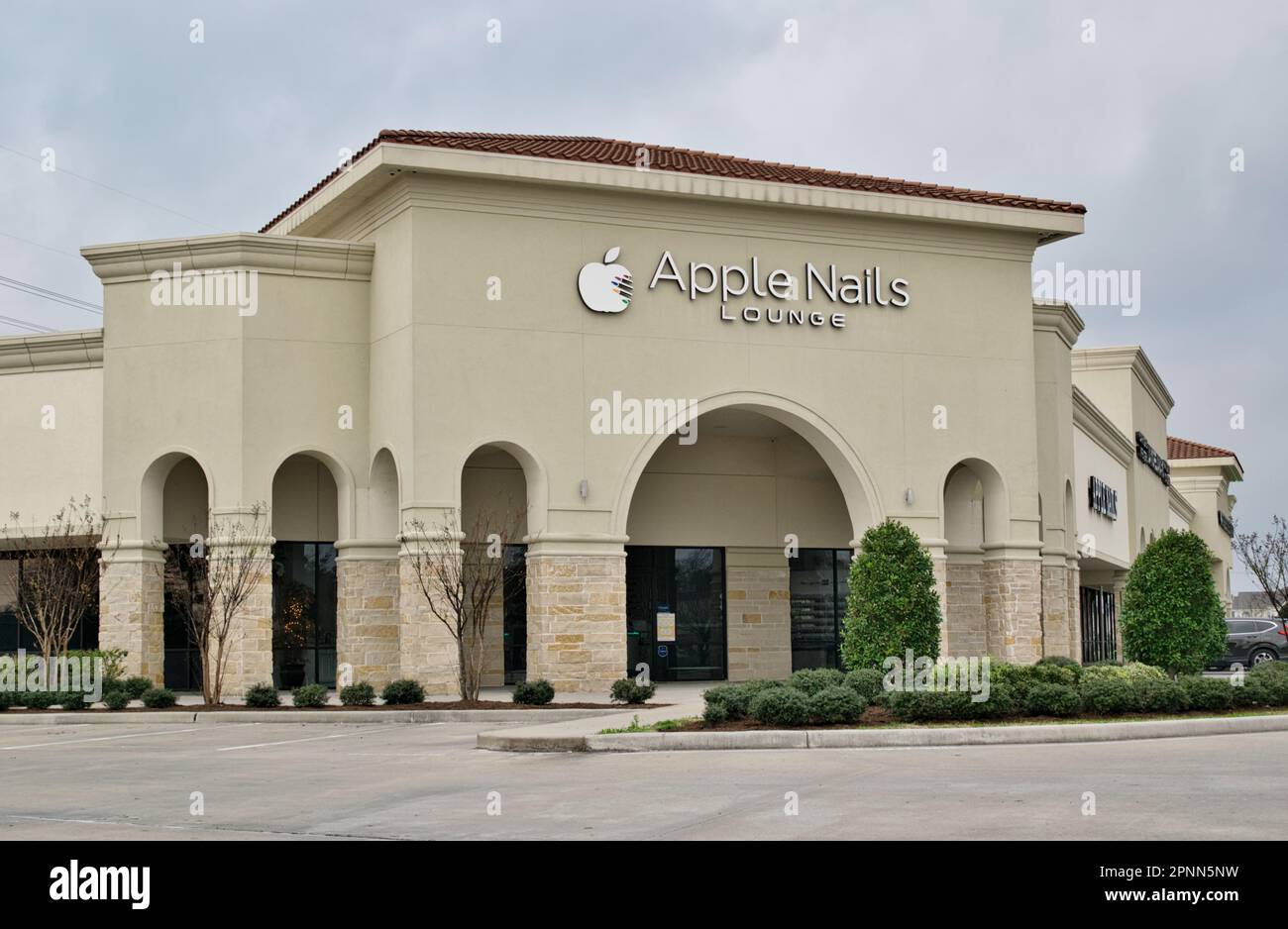 Humble, Texas USA 02-26-2023: Apple Nails Lounge storefront exterior in Humble, TX. Luxury spa and salon local business. Stock Photo