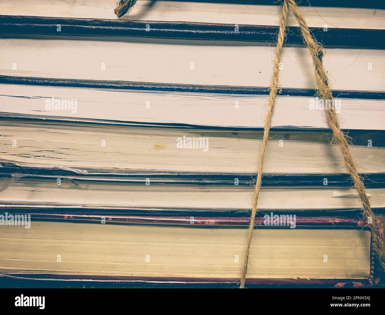 Wallpaper Ropes Book Pile of old books with rope background Stock Photo - Alamy
