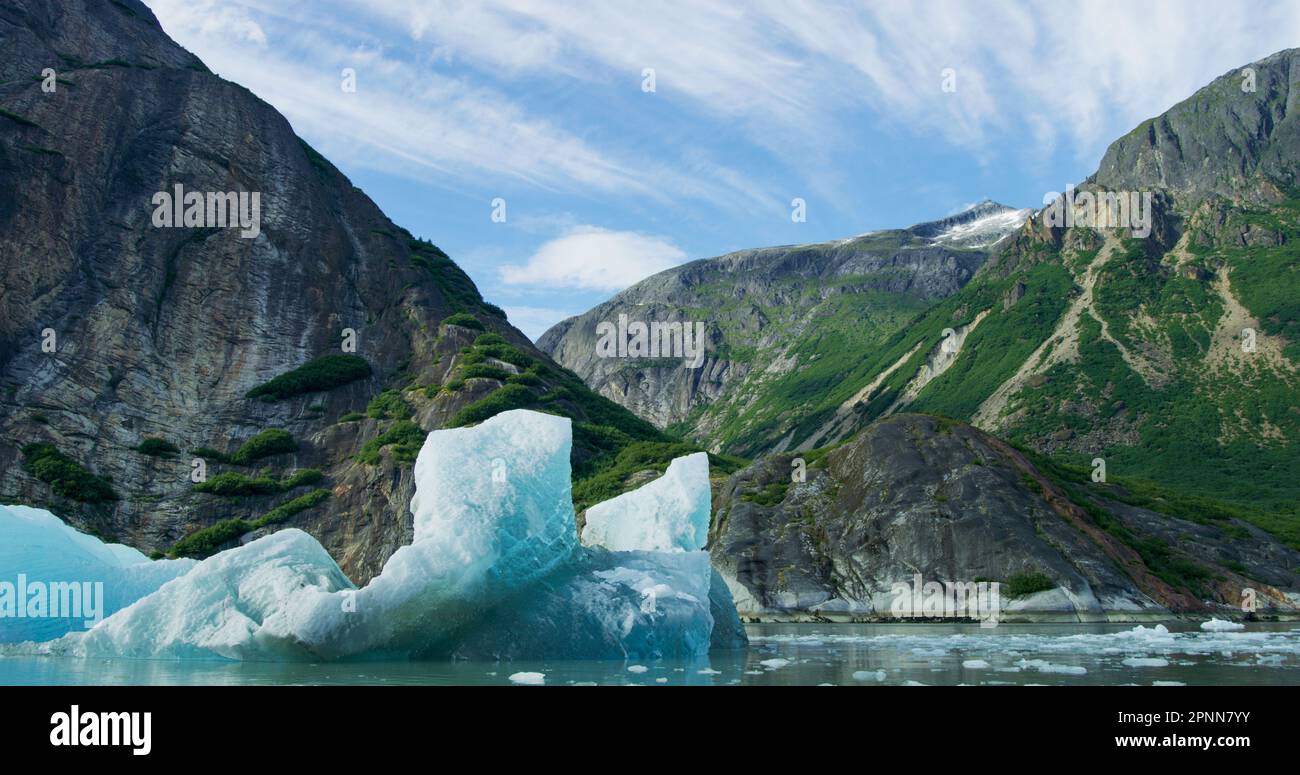 Watch the ice floes and icebergs on the river in a small boat. Rocks ...