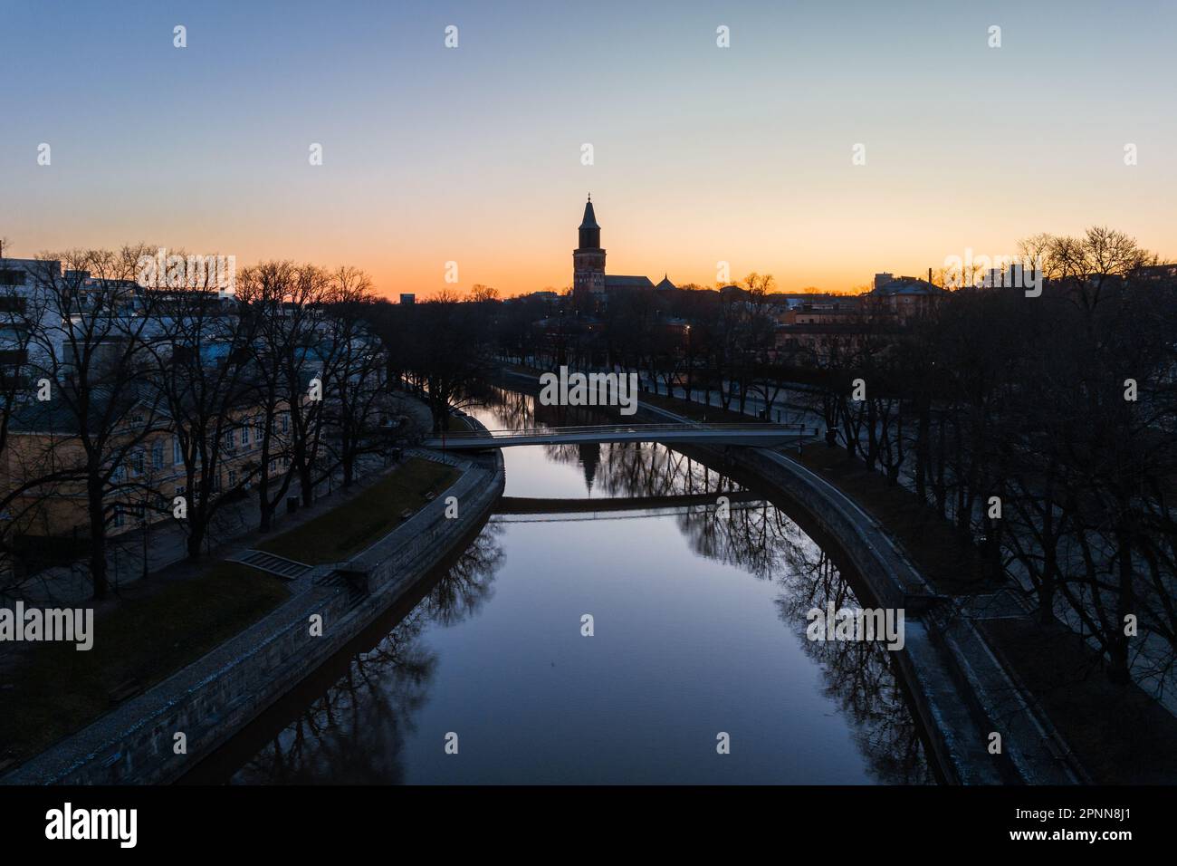 Aerial view of Aurajoki river at dawn with Turku Cathedral in the background in Turku, Finland Stock Photo