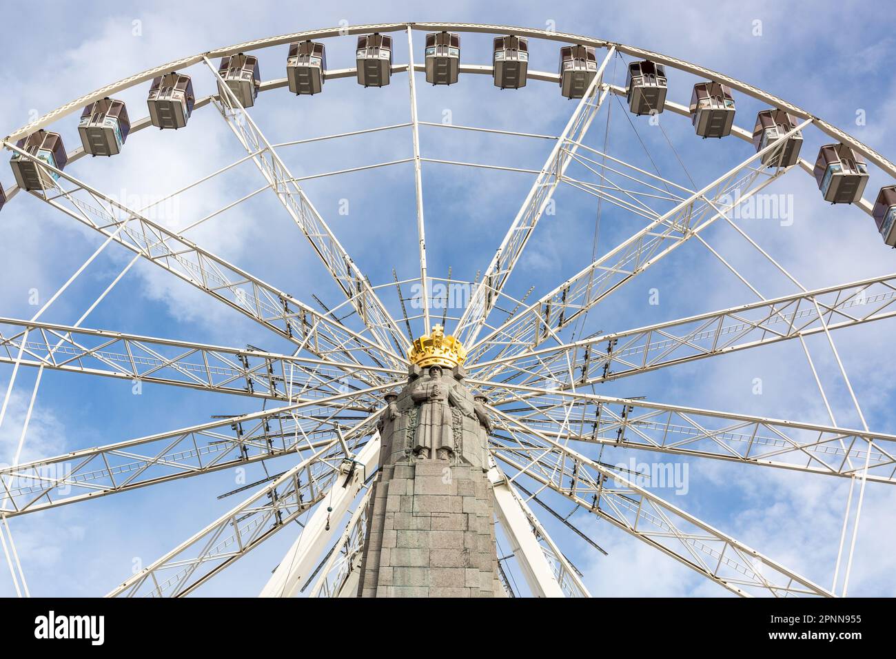 Ferris wheel installed on Place Poelaert in Brussels. War memorial in