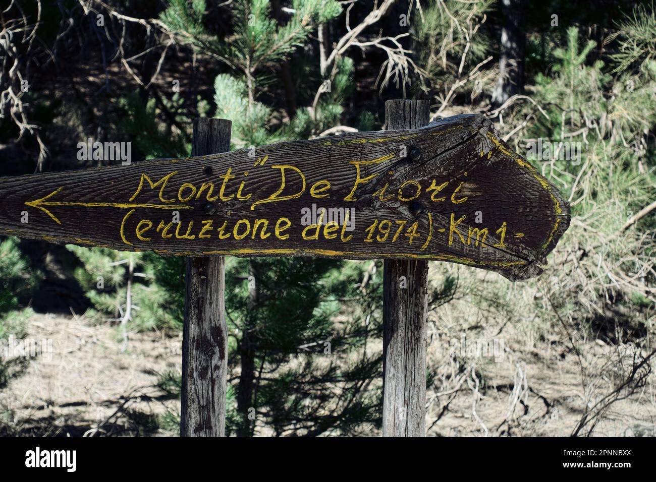 help tourist direction with text ''Monti de Fiori' - (eruzione del 1974) km 1' in Etna National Park, Sicily, Italy Stock Photo