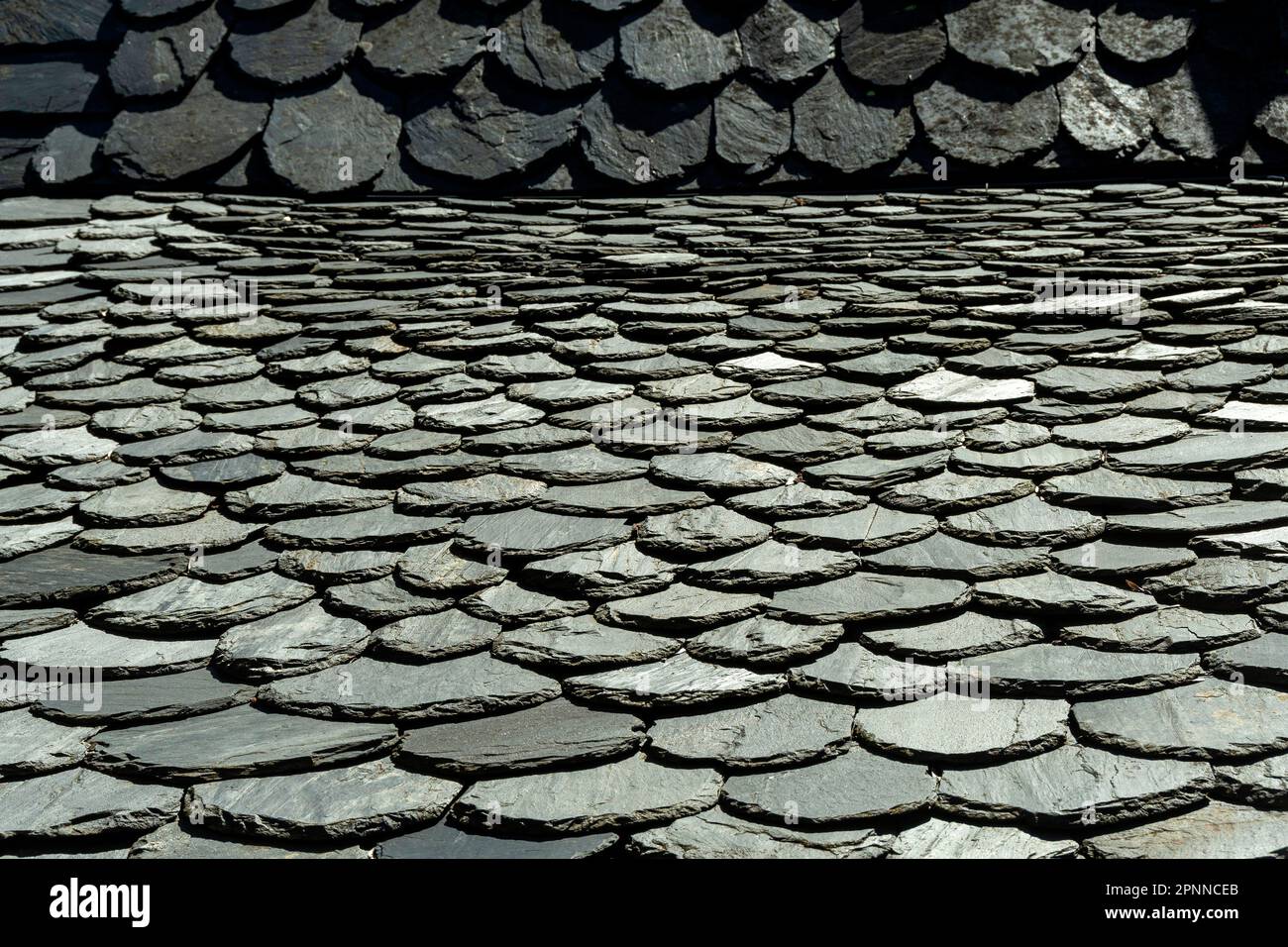 Traditional slate roof (lauze stone) in Auvergne, France Stock Photo