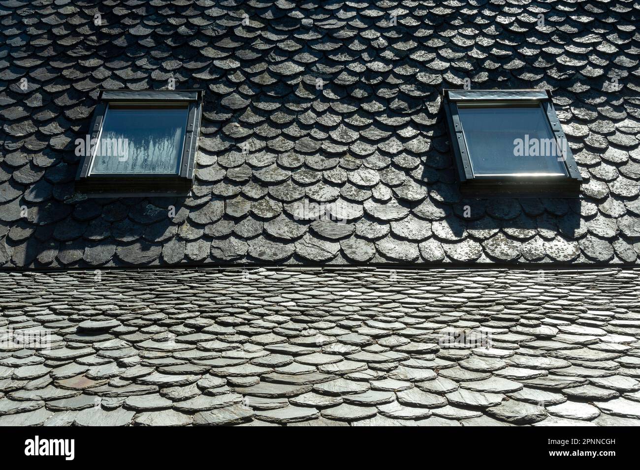 Traditional slate roof (lauze stone) in Auvergne, France Stock Photo