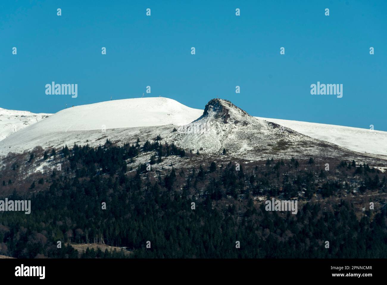 Roc de Courlande , Sancy massif in winter, regional natural park of the volcanoes of auvergne, Puy de Dome department, Auvergne Rhone Alpes, France Stock Photo
