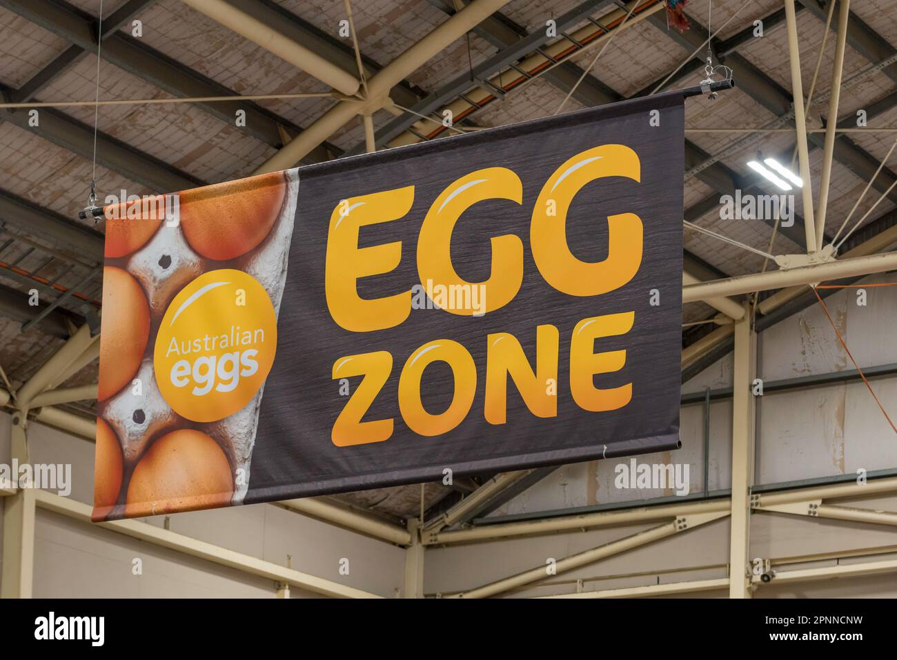 A large EGG Zone sign and photograph hanging in one of the animal pavilions at the 2023 Royal Easter Show in Sydney, Australia Stock Photo