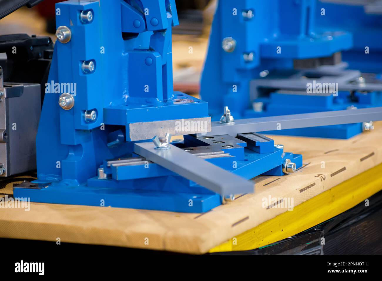 Punching presses special mechanisms for punching corners or punching