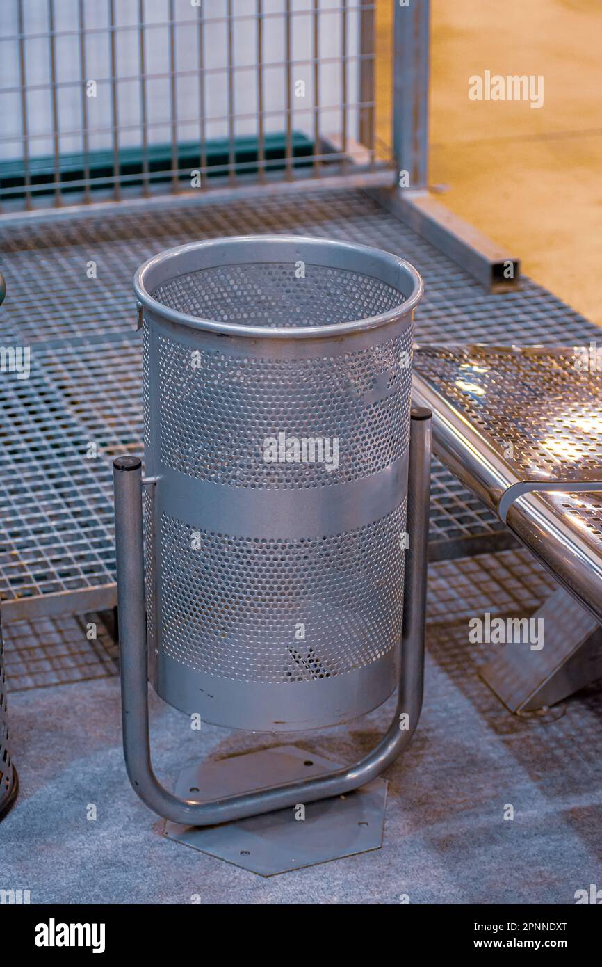 Iron street trash can on a stand Stock Photo Alamy