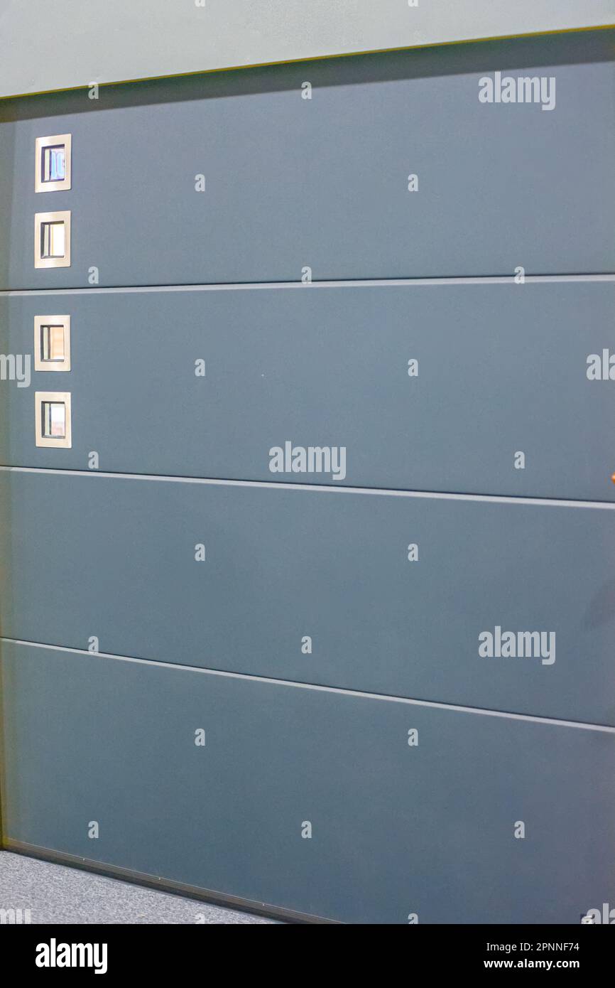 Automatic sectional metal garage doors Stock Photo Alamy